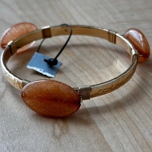 Butterscotch color bangle bracelet/ measures 8 inches/ gold tone/ gemsto…